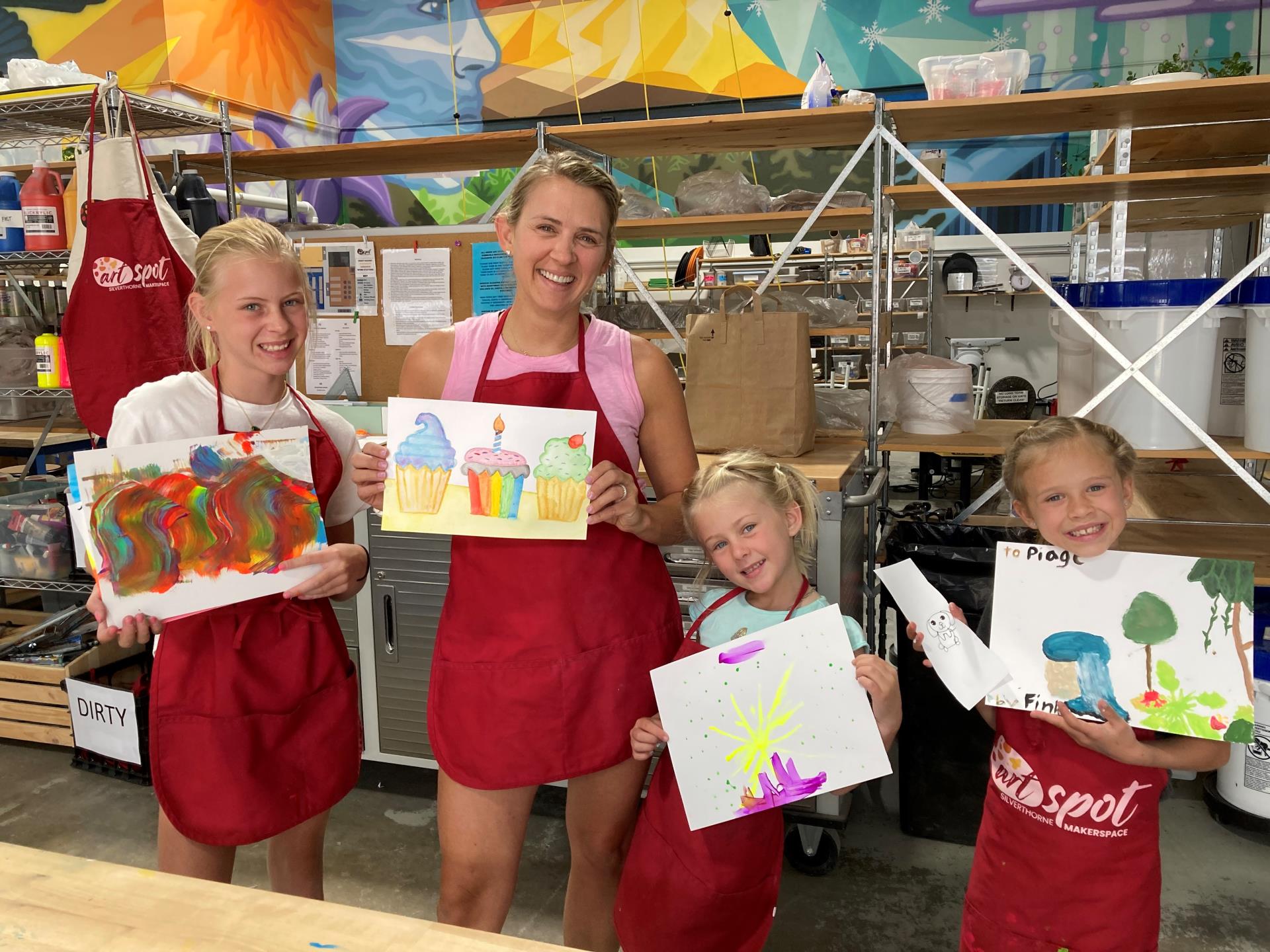 Paintingsmom and three daughters painting at the Art Spot